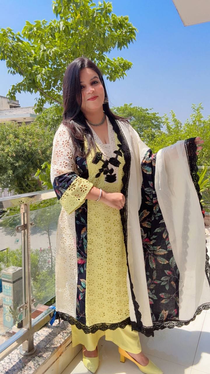 Schiffli Pakistani-style suit set featuring a contrasting Black And White floral dupatta