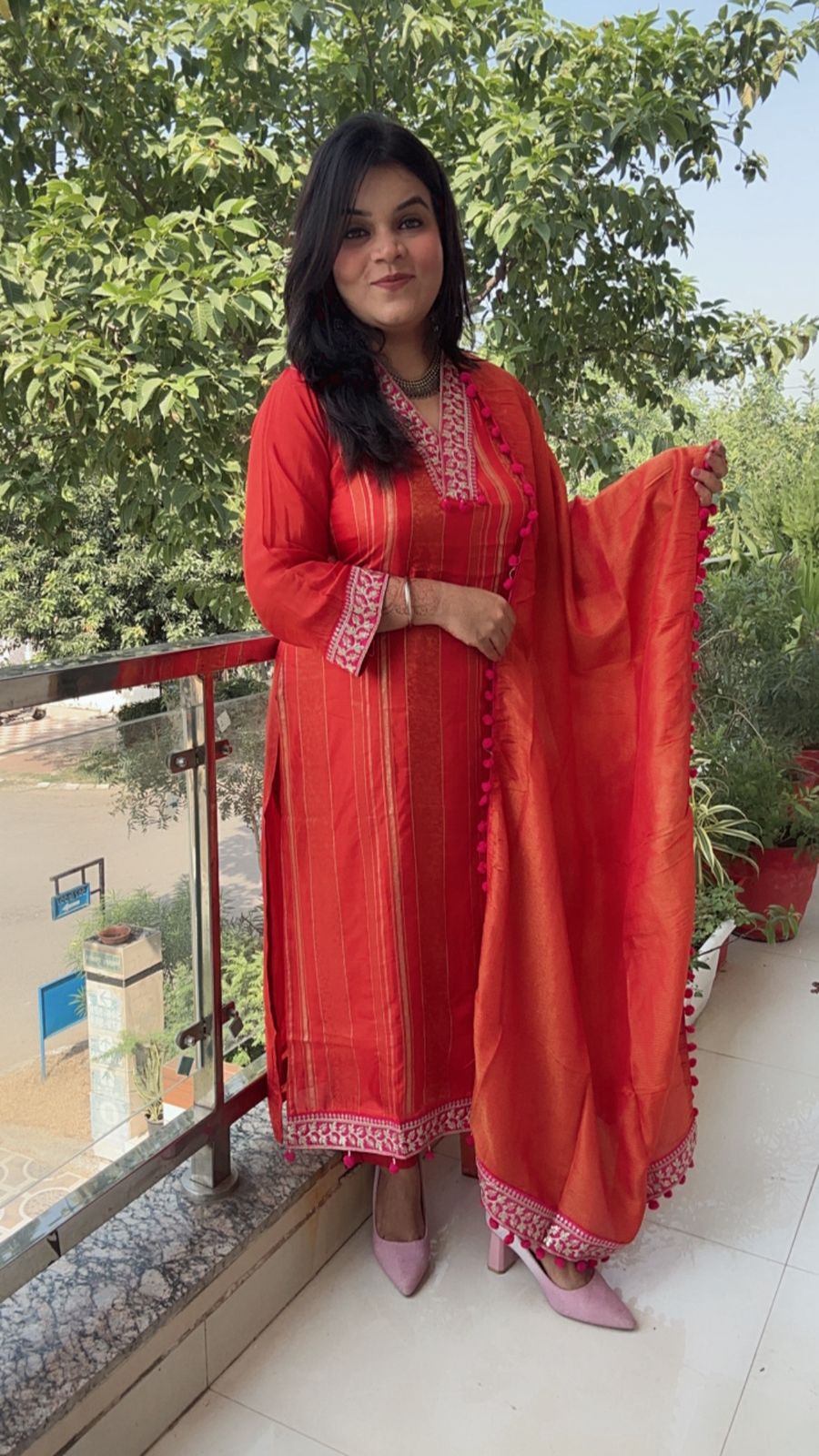 orange and pink suit