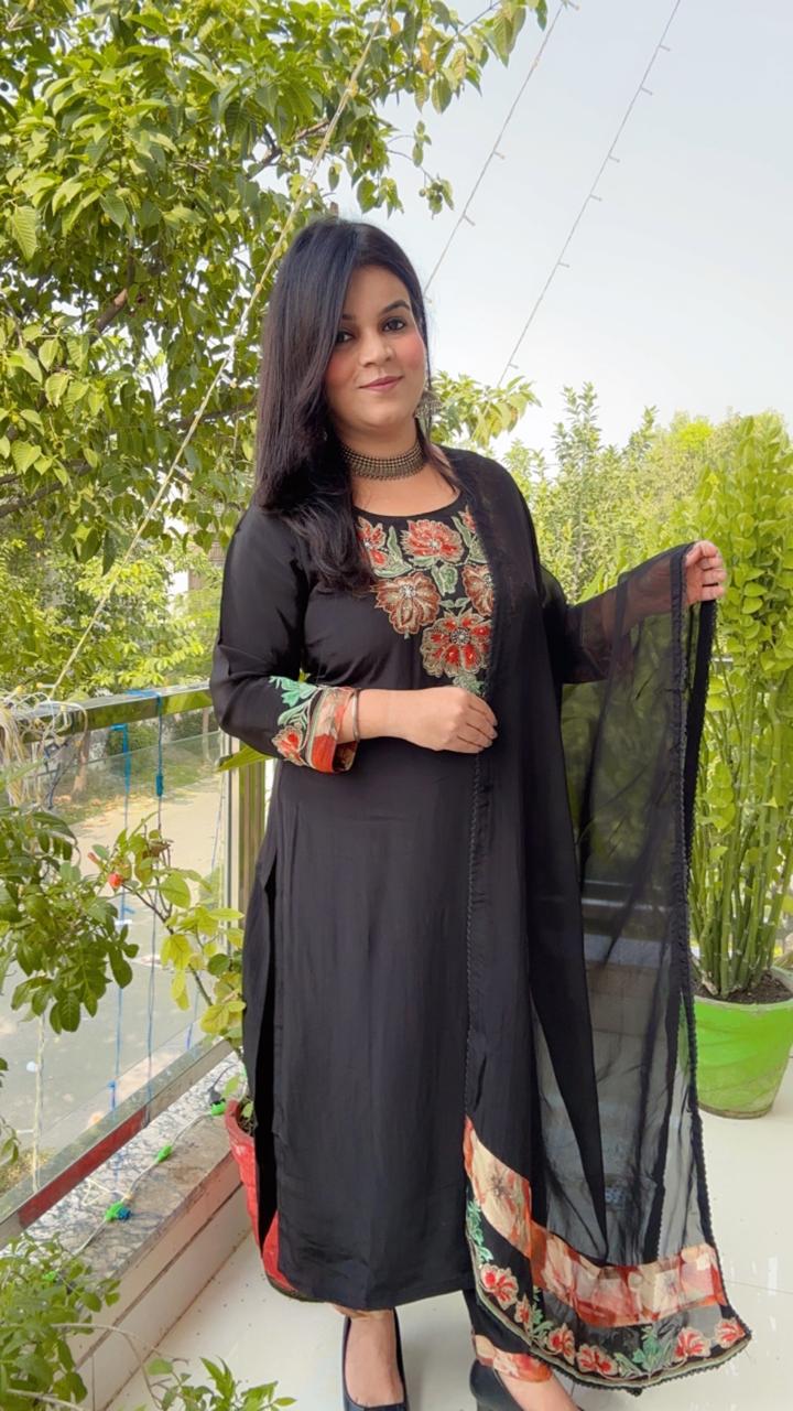 black embordierd suit