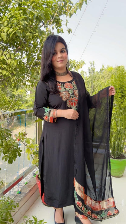 black embordierd suit