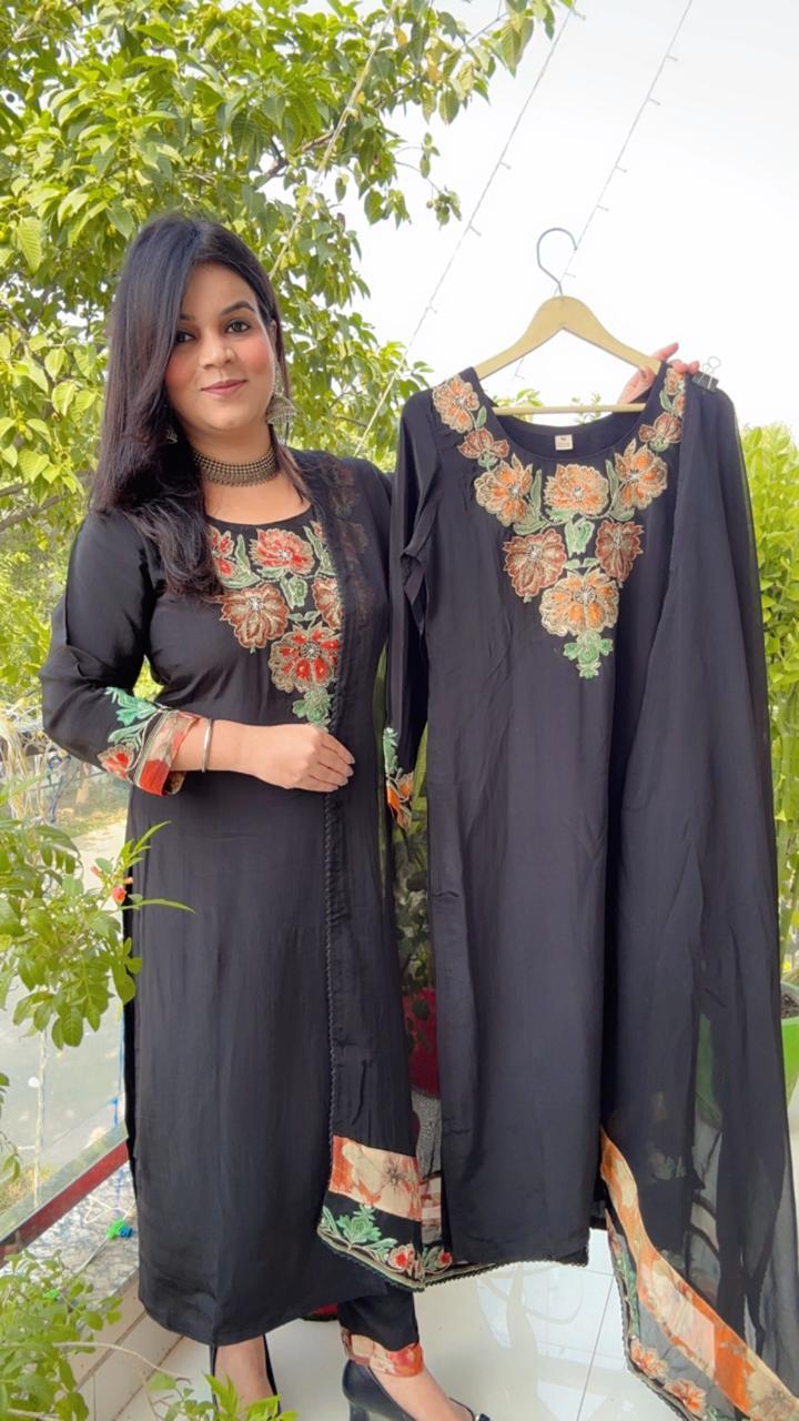 black suit with red embroidered