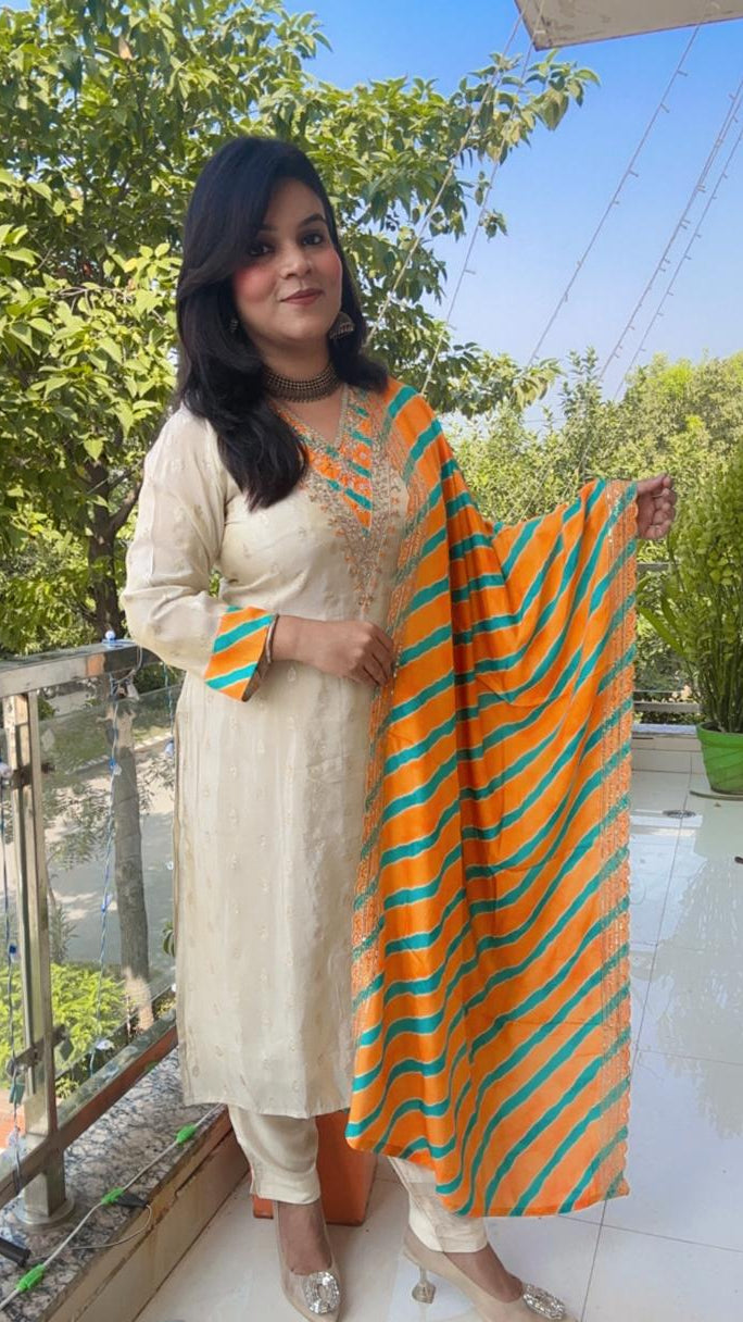 zari and embroidered white suit