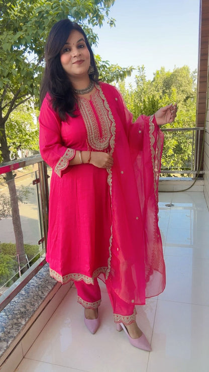 Pink Anarkali suit with golden embroidery