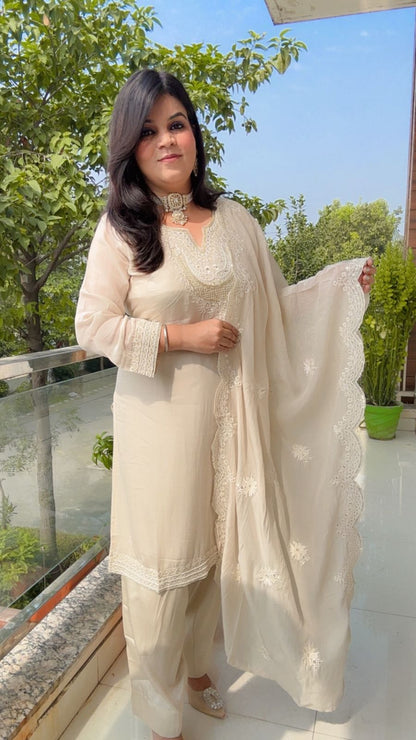 white-on-white embroidery suit