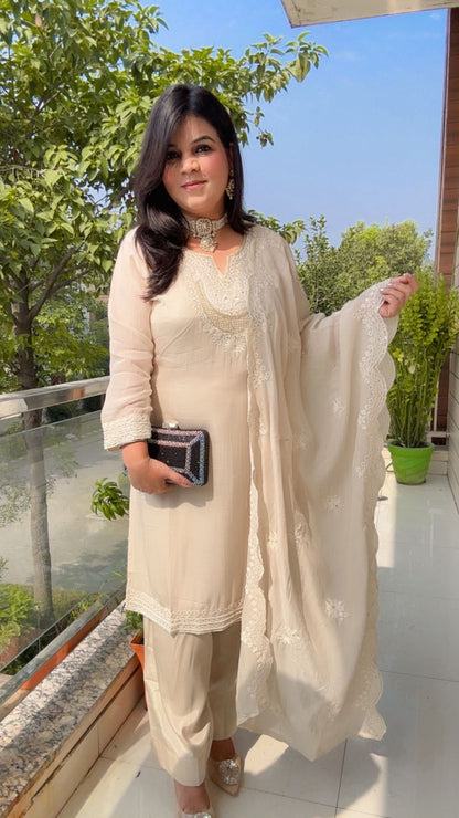 white-on-white embroidery suit