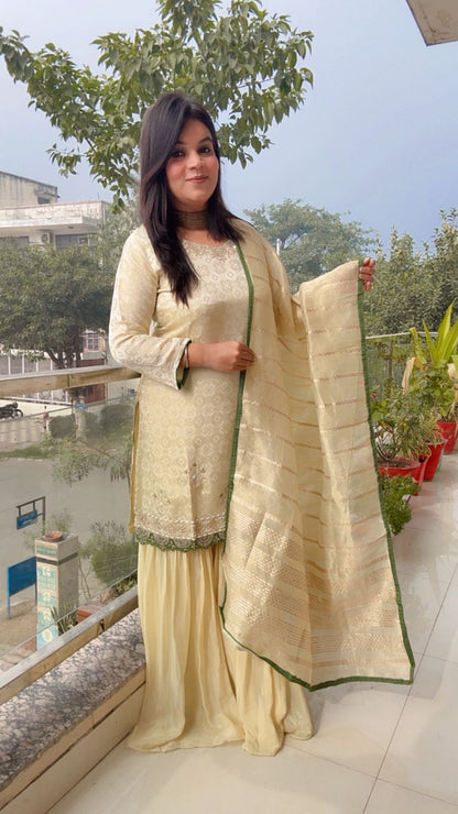 Elegant Ivory Sharara Set with Emerald Accents