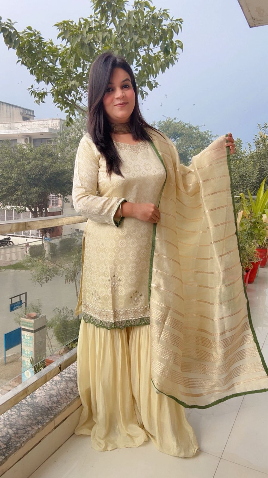 Elegant Ivory Sharara Set with Emerald Accents