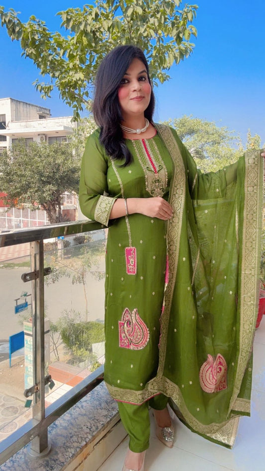 Focusing on the beautiful Sheesha work on the neckline.