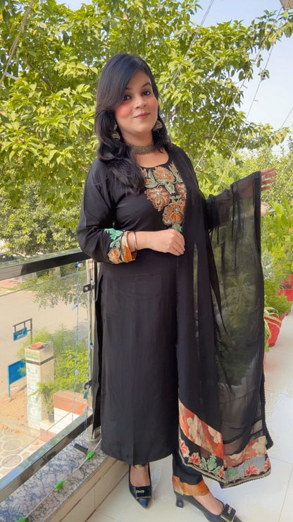 black embordierd suit