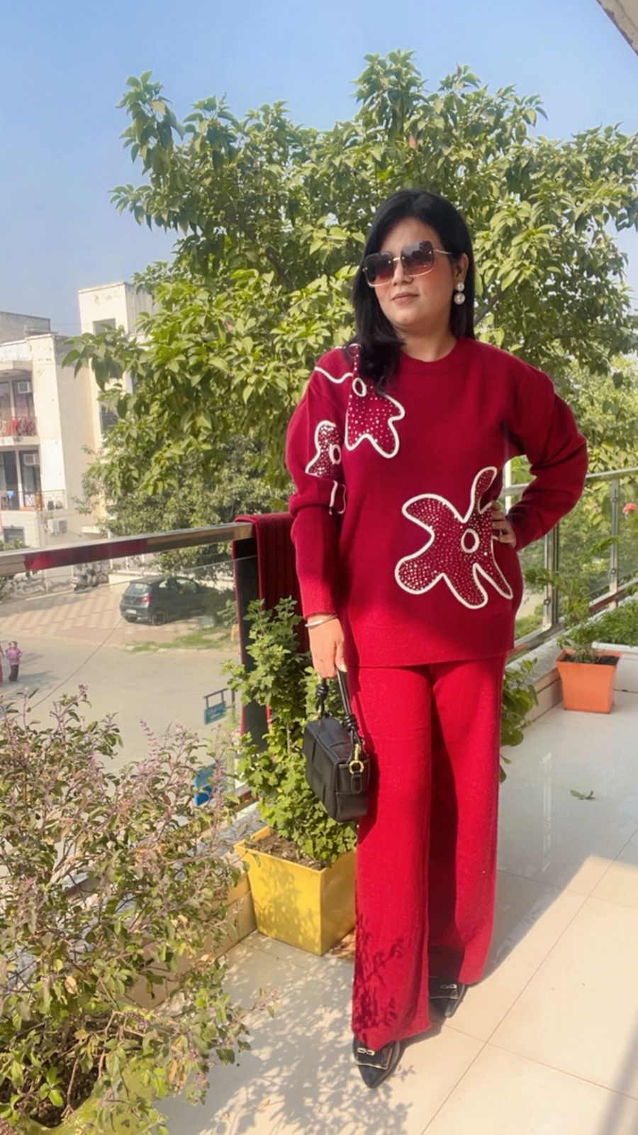 the Maroonvknit co-ord set with the abstract/studded pattern.