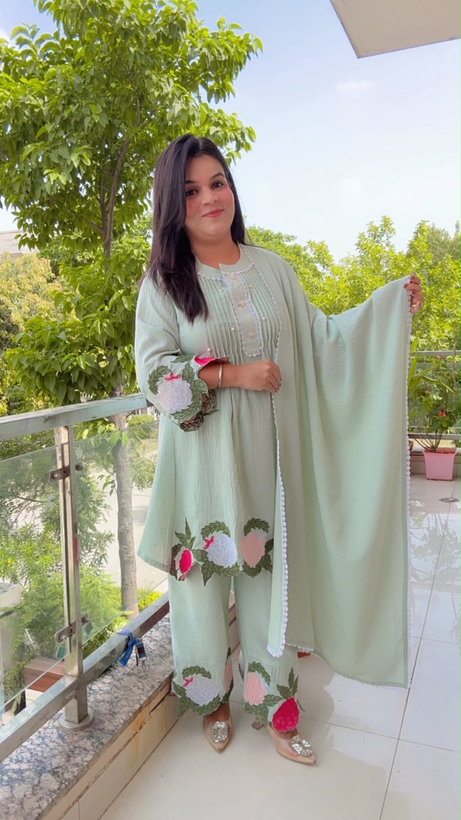 Emerald green linen suit with floral embroidery