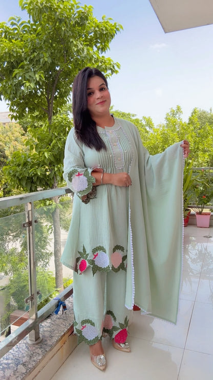 Emerald green linen suit with floral embroidery