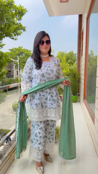 white schiffli cotton kurta with a botanical green print